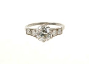 Fine 1930s diamond ring the central stone flanked by diamond set shoulders
