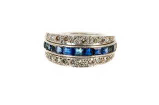 Art Deco diamond, ruby and sapphire three row eternity ring with a platinum band set with calibre cu