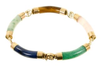 Chinese hardstone and yellow metal mounted bracelet with curved tubular hardstone links and yellow m