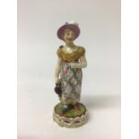 Derby figure of a young girl, circa 1820