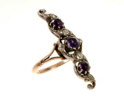 Edwardian amethyst and diamond ring with a finger-line scrolling openwork foliage with amethysts and