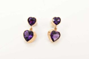Pair of amethyst heart shaped pendant earrings, each with two heart shaped amethysts suspended from