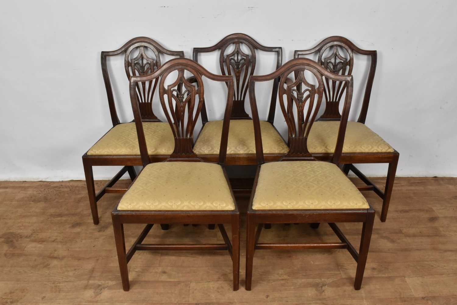 Set of five late 18th century Hepplewhite style mahogany dining chairs