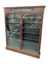 Victorian mahogany chemist's cabinet, the frieze with inset gilt emblazoned sign 'DISPENCING DEPARTM