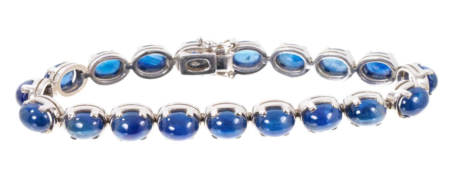Cabochon blue sapphire and 18ct white gold bracelet with nineteen blue sapphire oval cabochons in 18 - Image 3 of 3