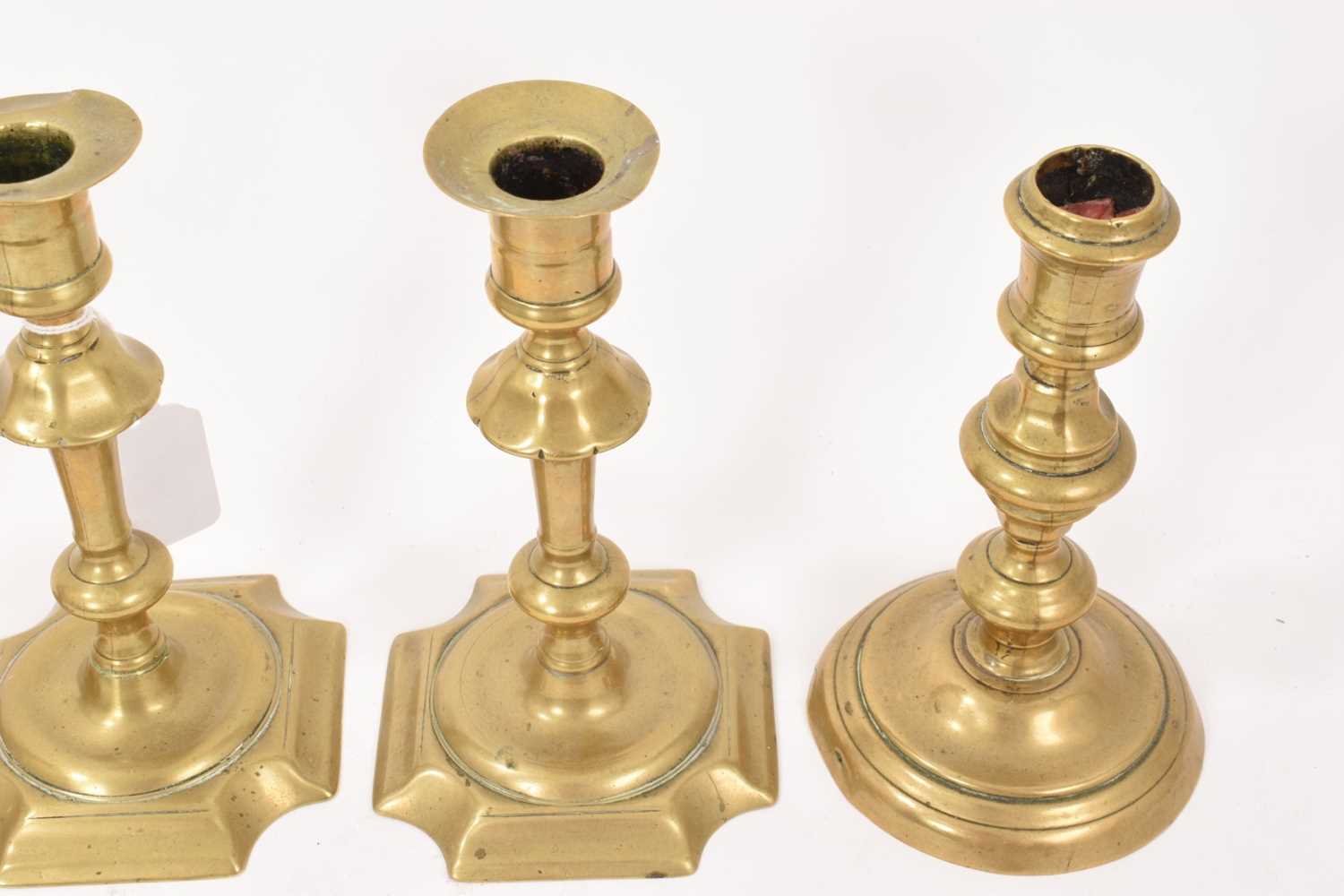 Pair of mid 18th century brass candlesticks and another pair. (4) - Image 3 of 12