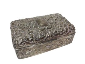 Victorian silver jewellery casket of rectangular form with embossed scroll and foliate decoration