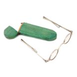 Pair of George III silver framed spectacles in a green shagreen spectacle case