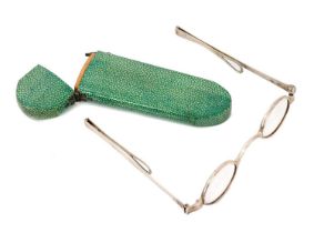 Pair of George III silver framed spectacles in a green shagreen spectacle case