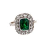 1920s diamond and green stone platinum ring