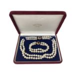 Cultured pearl two strand necklace and bracelet, each with two strings of 8mm cultured pearls on a g