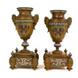 Two 19th century French brass and champlevé enamel urns