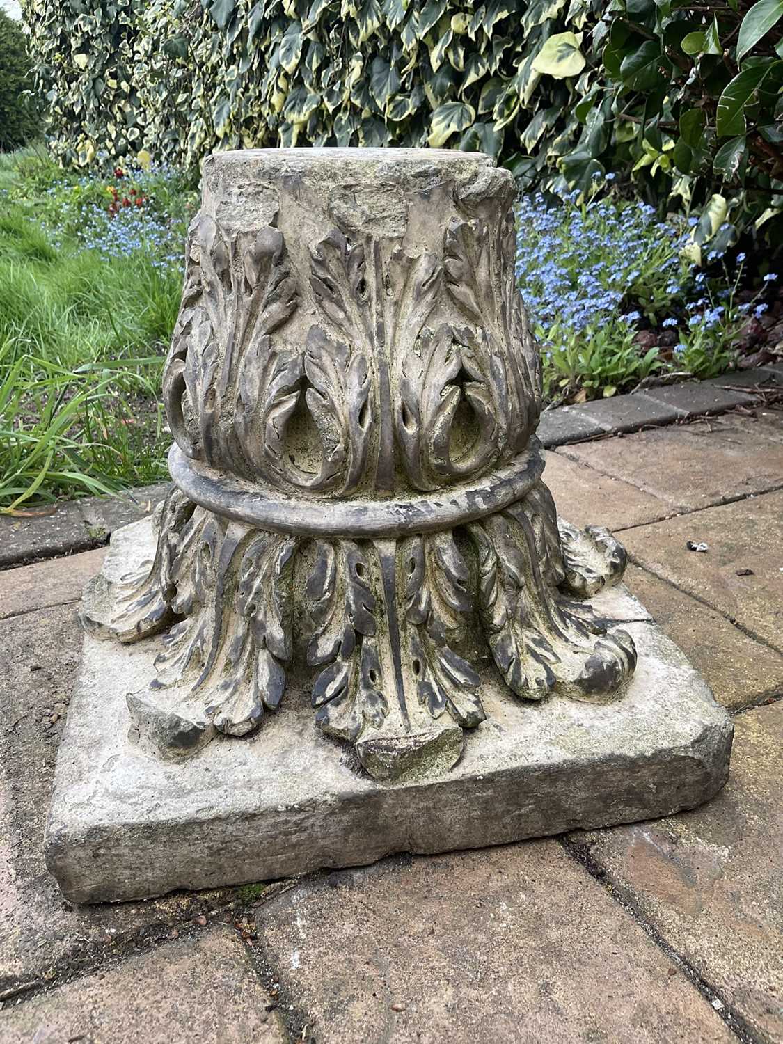 Antique reconstituted stone/coade stone capital with acanthus leaf design, 32cm high x 34cm wide.