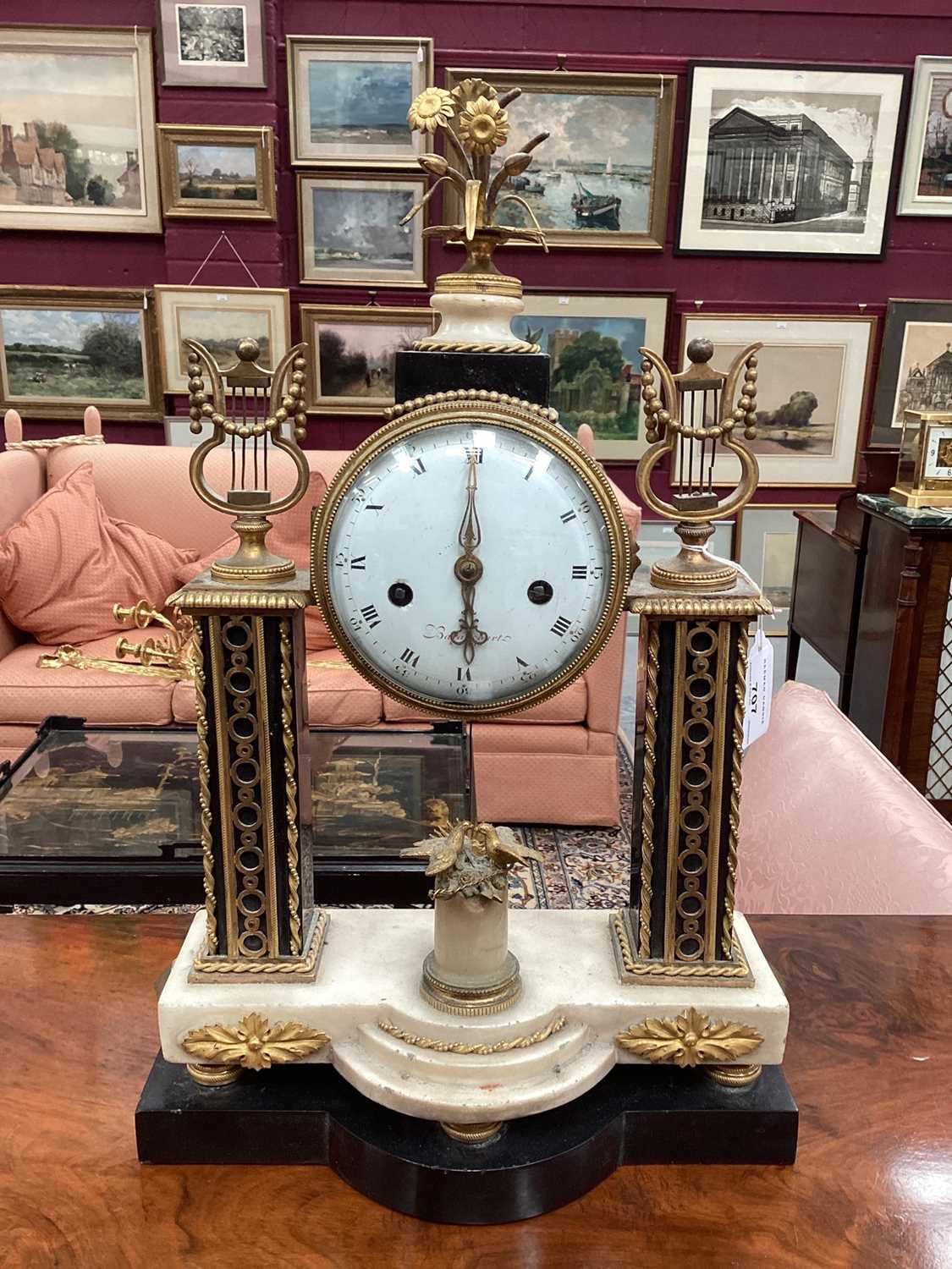 Early 19th century French Louis XVI-style marble and ormolu mantel clock