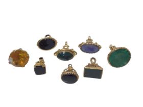 Collection of eight 9ct gold mounted seals/fobs inset with various hardstones (8)