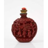 Finely carved cinnabar lacquer snuff bottle