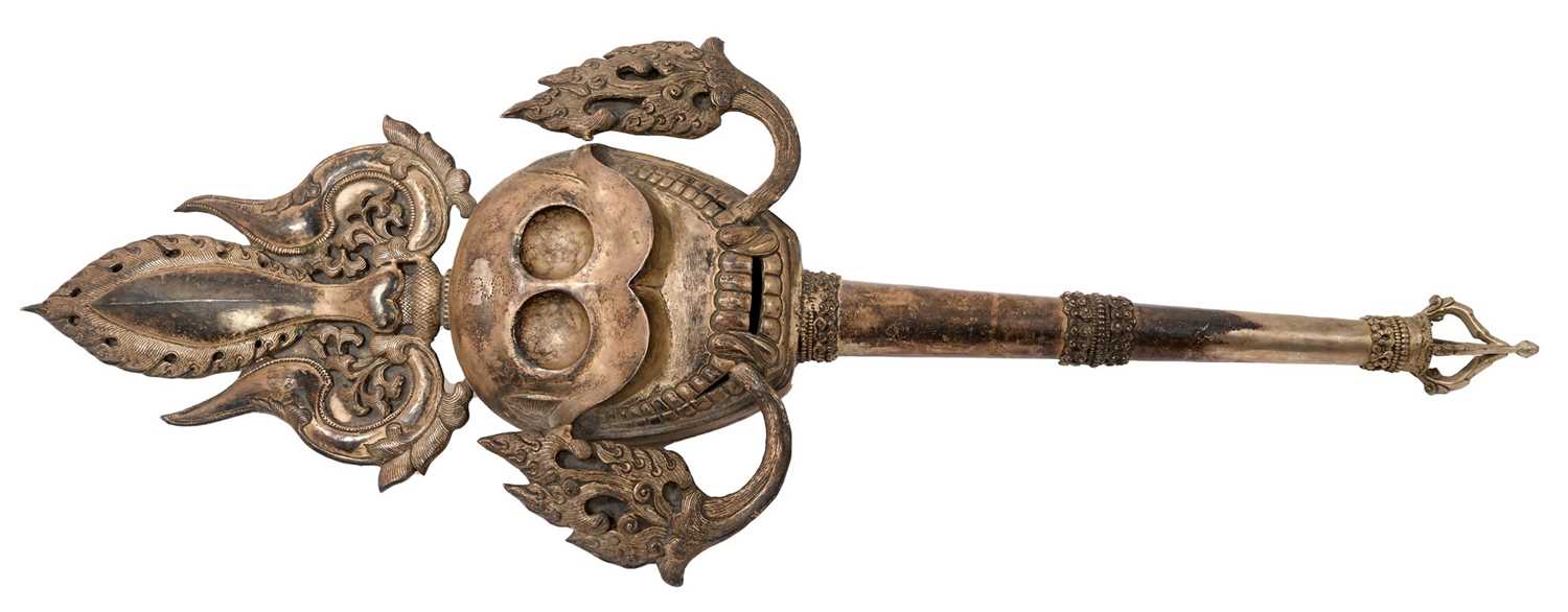 Antiquei Tibetan ceremonial staff, with stylised skull ornament, 60cm long