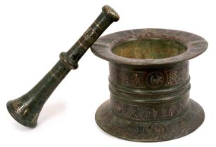 Fine and large antique Islamic cast bronze pestle and mortar with inlaid silver decoration