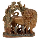 Rare saltglazed arbour group of a lion