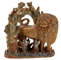 Rare saltglazed arbour group of a lion