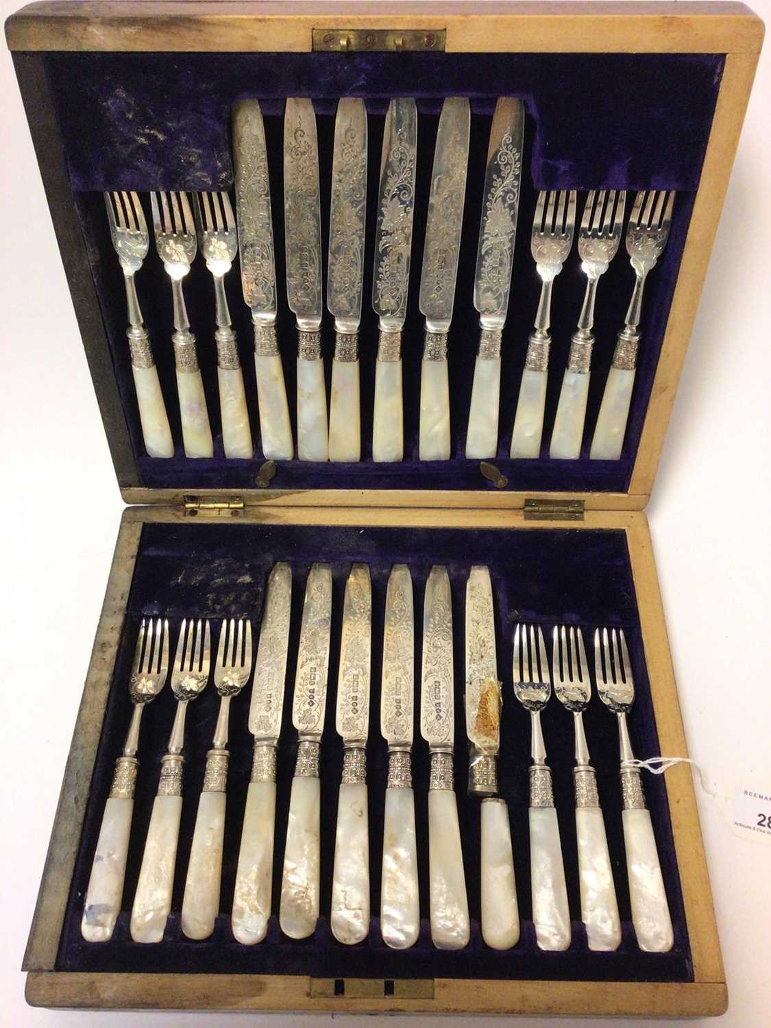 Cased set of 12 pairs of Edwardian silver and mother of pearl desert knives and forks