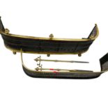 Two 19th century brass fenders and two pokers