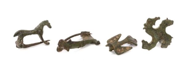 Four Roman brooches