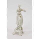 Lowestoft white glazed figure of a female lute player