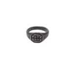 Medieval silver seal ring with St monogram