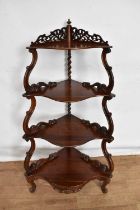 Victorian rosewood corner whatnot, with four graduated shaped tiers on cabriole legs, 62cm wide x 42