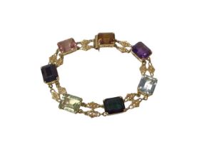 Gold and multi-gem bracelet