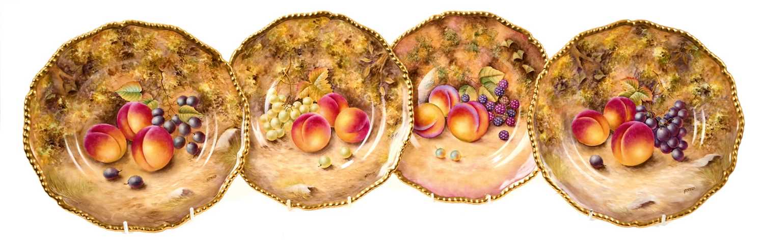 Four Royal Worcester plates, painted with studies of fruit, three signed by N. Creed and one by D. S