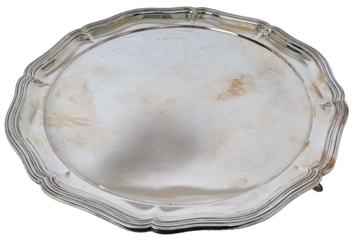 Large silver tray with pie crust border.