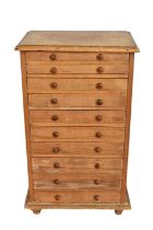Antique pine collector's chest of ten drawers