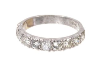 Diamond eternity ring with a band of nine old cut diamonds