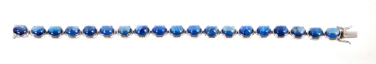Cabochon blue sapphire and 18ct white gold bracelet with nineteen blue sapphire oval cabochons in 18 - Image 2 of 3
