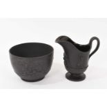 Wedgwood black basalt helmet shaped jug and matching round bowl circa 1790-1800