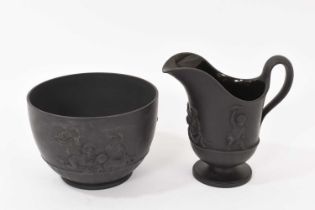 Wedgwood black basalt helmet shaped jug and matching round bowl circa 1790-1800