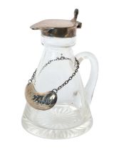 1930s silver mounted whisky tot of conical form, with cut glass body and silver hinged cover