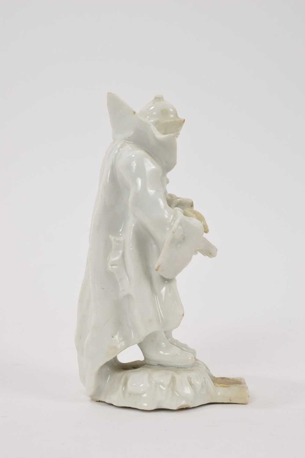 18th century white glazed porcelain figure of a man in a greatcoat, losses and restoration - Bild 4 aus 7