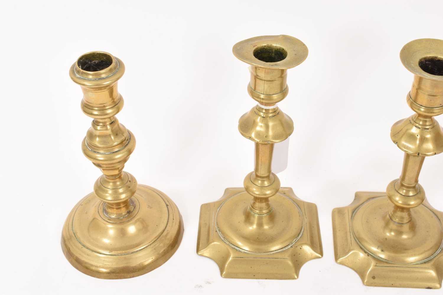 Pair of mid 18th century brass candlesticks and another pair. (4) - Image 2 of 12