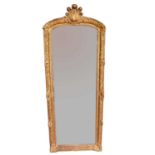 Rare Louis XIV giltwood and gesso pier mirror with original glass in two parts, early 18th century