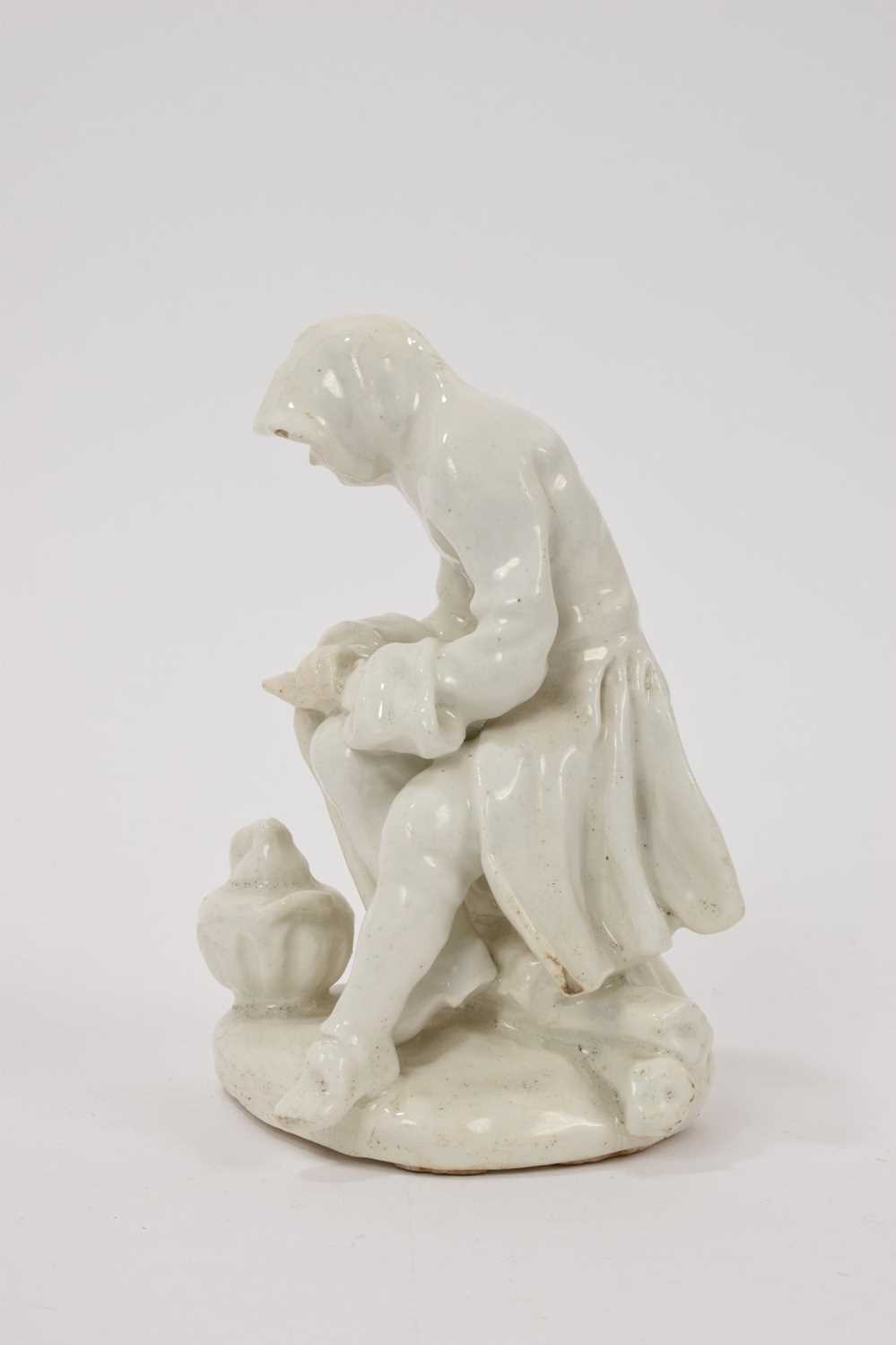 Bow white glazed porcelain figure of a man before a brazier emblematic of winter, probably Longton H - Image 2 of 5