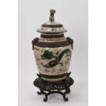 Chinese famille verte crackle glazed vase and cover, circa 1900, decorated with dragons chasing a fl