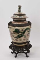 Chinese famille verte crackle glazed vase and cover, circa 1900, decorated with dragons chasing a fl