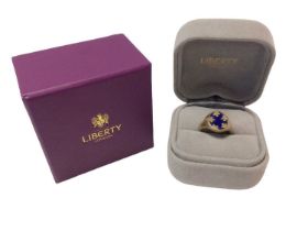 Liberty gold and lapis lazuli signet ring with an oval bezel inset with a lapis lazuli plaque and go