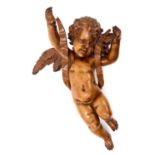 Antique Italian carved lime cherub