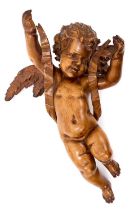 Antique Italian carved lime cherub