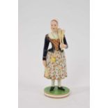 Derby figure of a broom seller, circa 1815-20