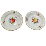 Pair of Wedgwood bone china plates, painted with flowers